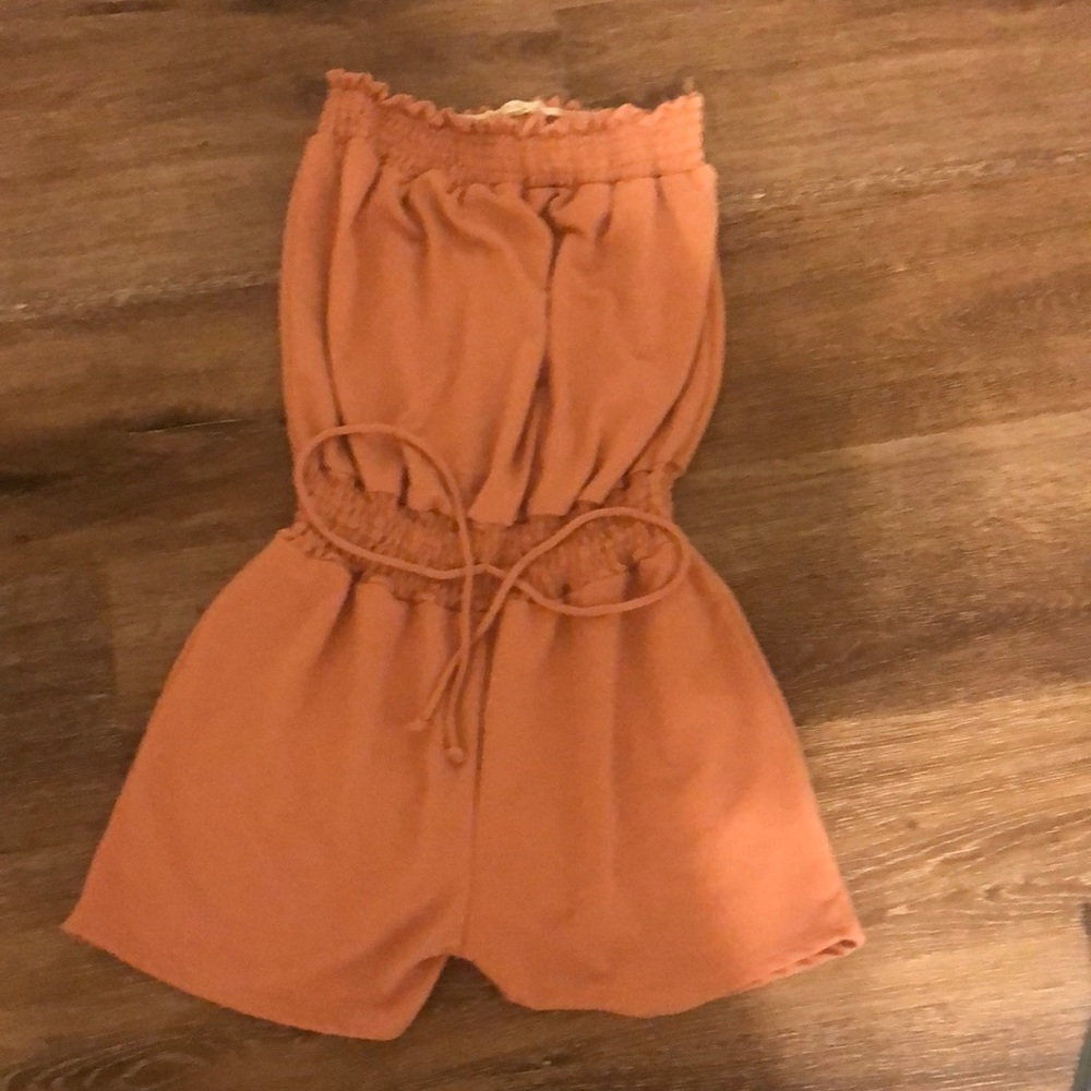 faded pink romper from Heart hips